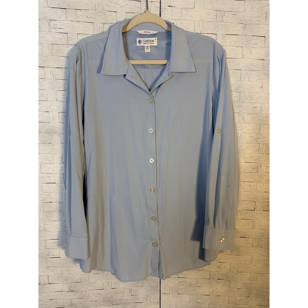 Coolibar women’s button up blouse light blue SPF 50 invented oil tap sleeve ￼